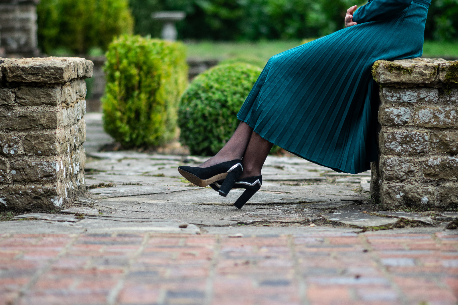 Premium quality sheer hosiery tights on a model wearing black shoes