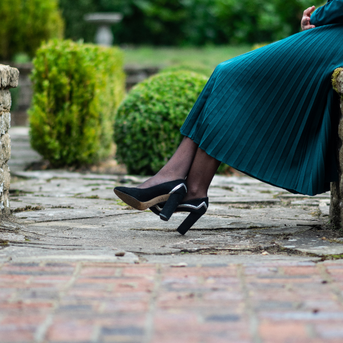 Premium quality sheer hosiery tights on a model wearing black shoes